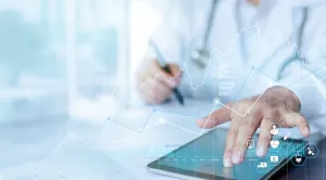 Picture of as scientist working with a tablet