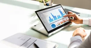 Picture of a person working on financial data