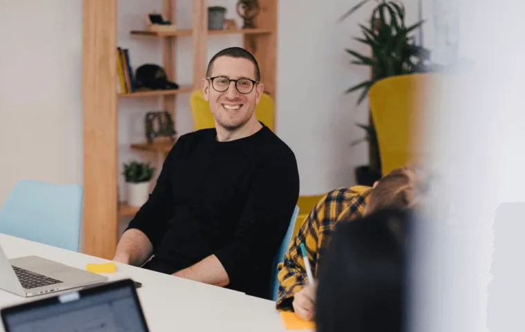 Picture of a man attending a meeting