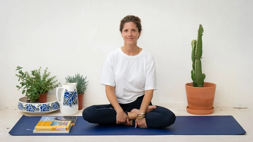 Picture of Anna living with myasthenia gravis practicing yoga